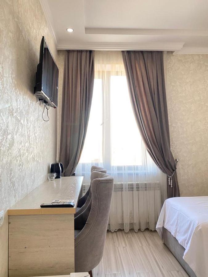 Comfort Hotel Turkistan Bagian luar foto