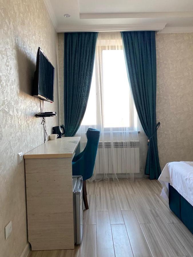 Comfort Hotel Turkistan Bagian luar foto