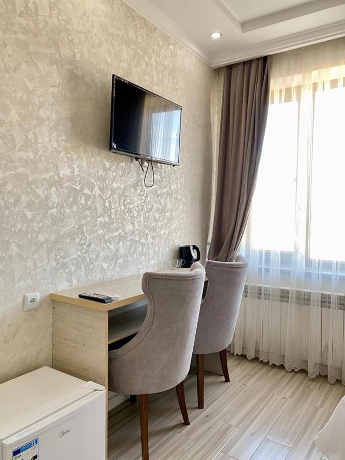 Comfort Hotel Turkistan Bagian luar foto